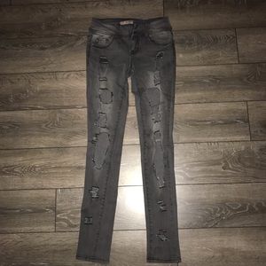 Women’s ripped grey wash jeans